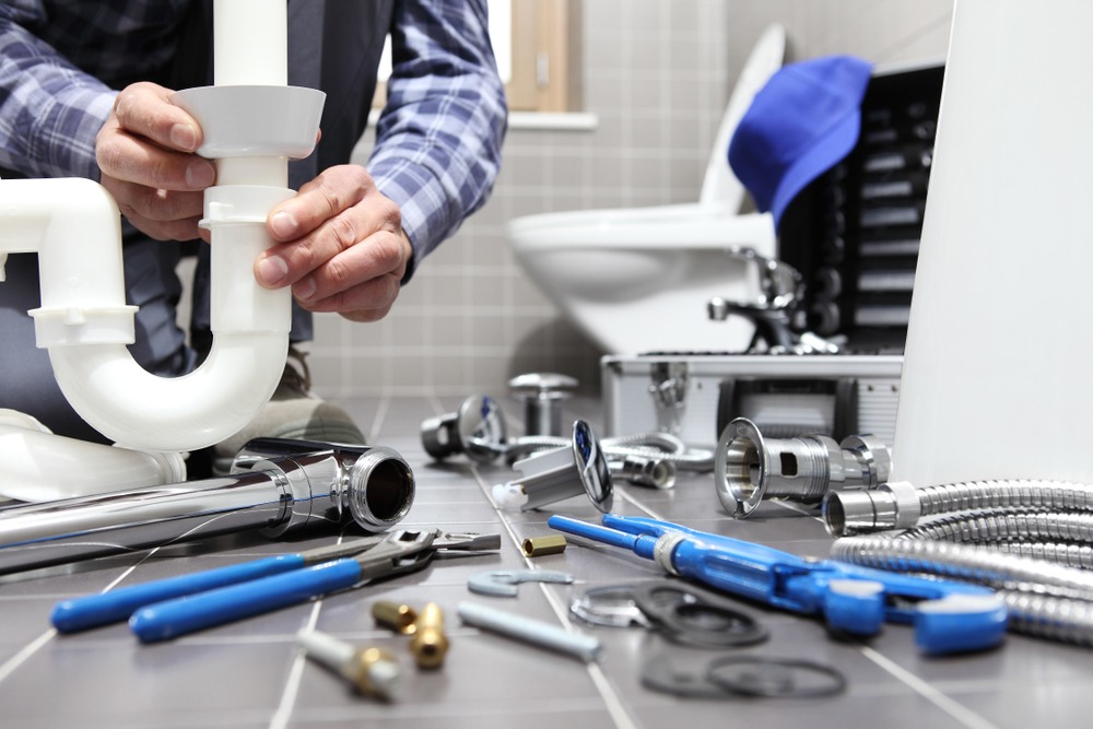 Licensed Spring TX plumbing professionals at Fast Track Plumbing LLC handling modern plumbing equipment